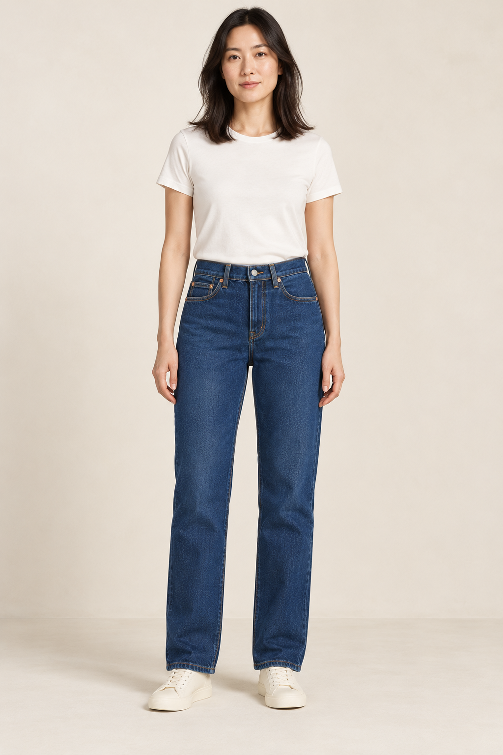 Adult woman wearing the COMMON FORM Women's Straight Leg Jean in Indigo.